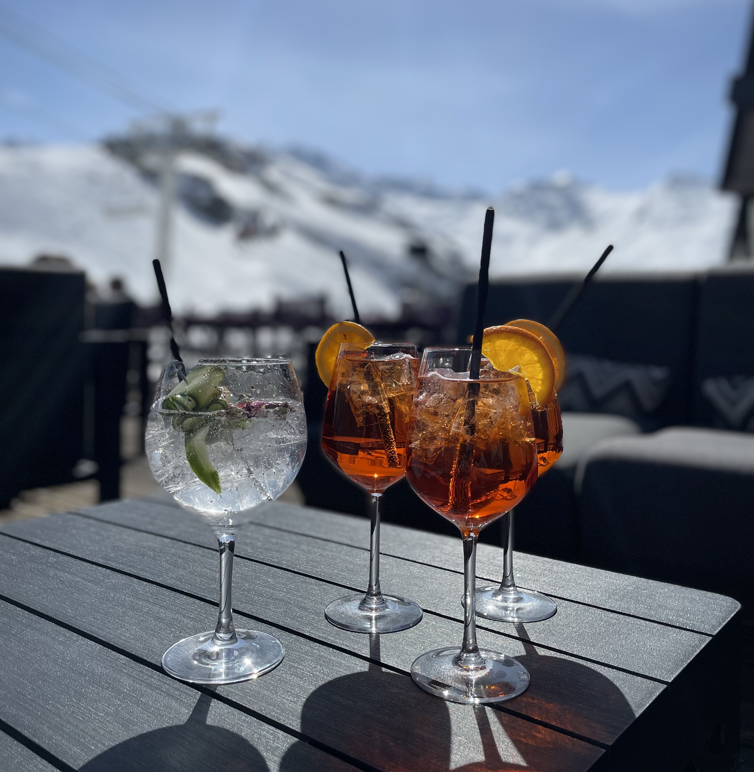 Drinks on a sunny terrace at the Altapura hotel in Val Thorens